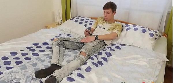  Teen rubs his oily feet